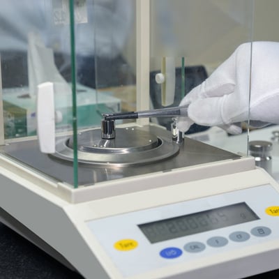 iStock-608542366-mass-weights-calibration